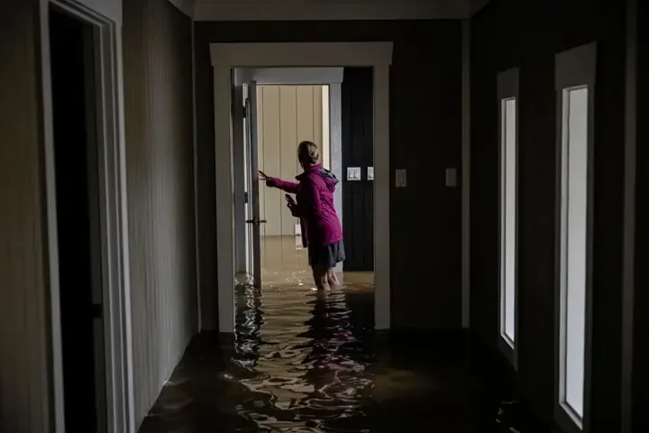 Floodwater standing in a hallway after heavy rain